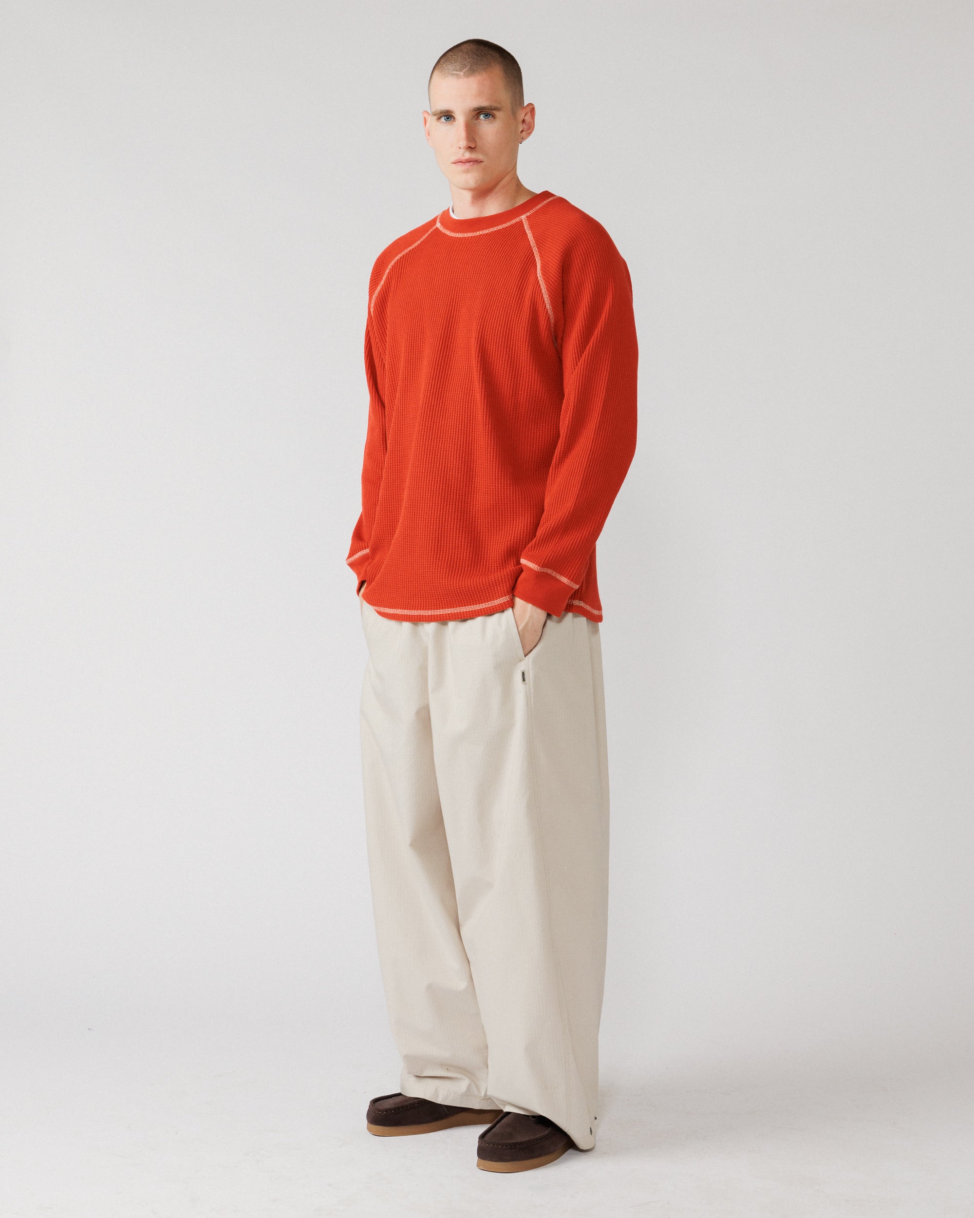 Raglan Range Waffle Knit - Signal Red w Ecru — 3/4 angle, relaxed drape