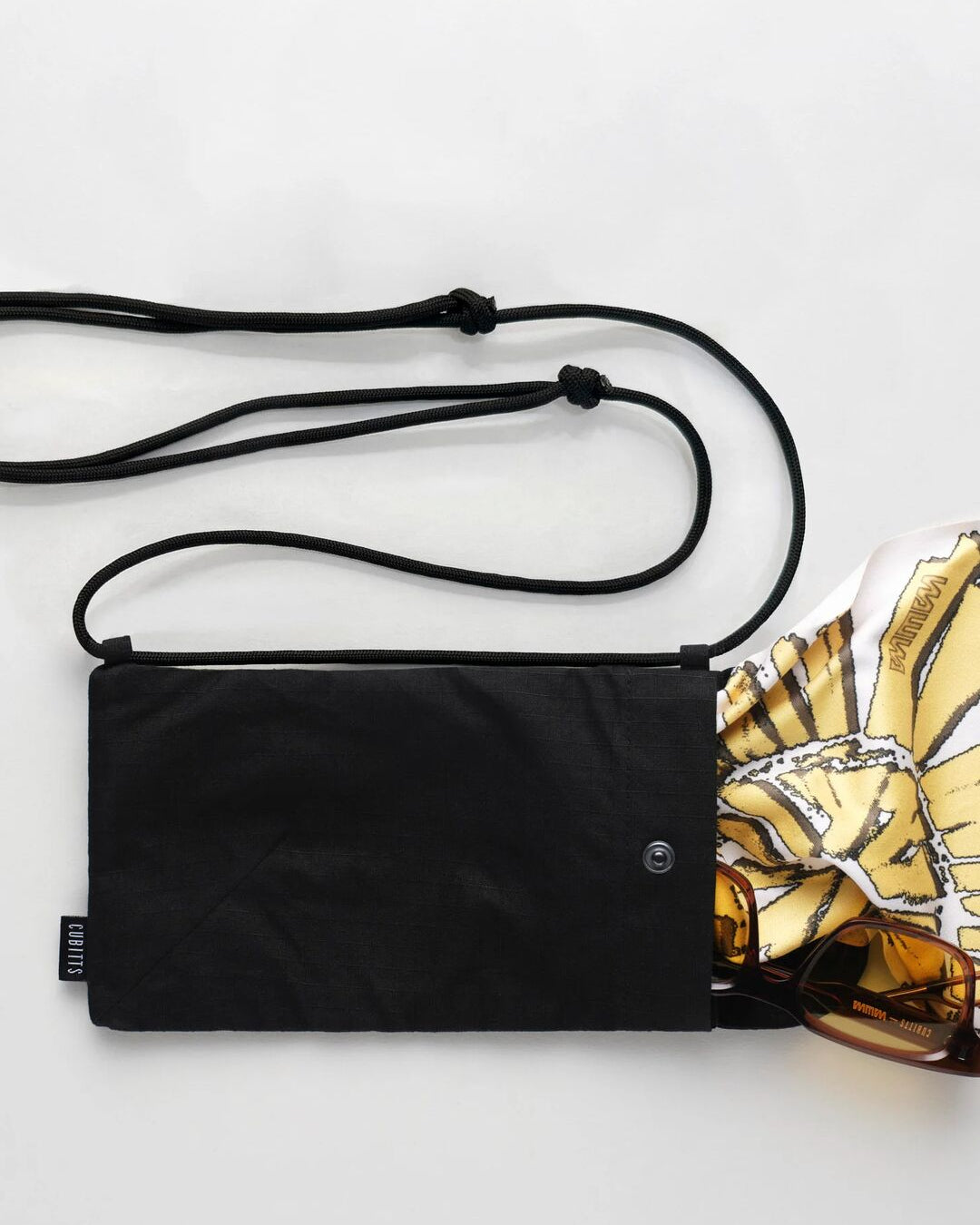 Black Sunnies Sling with printed lens cloth and sunglasses
