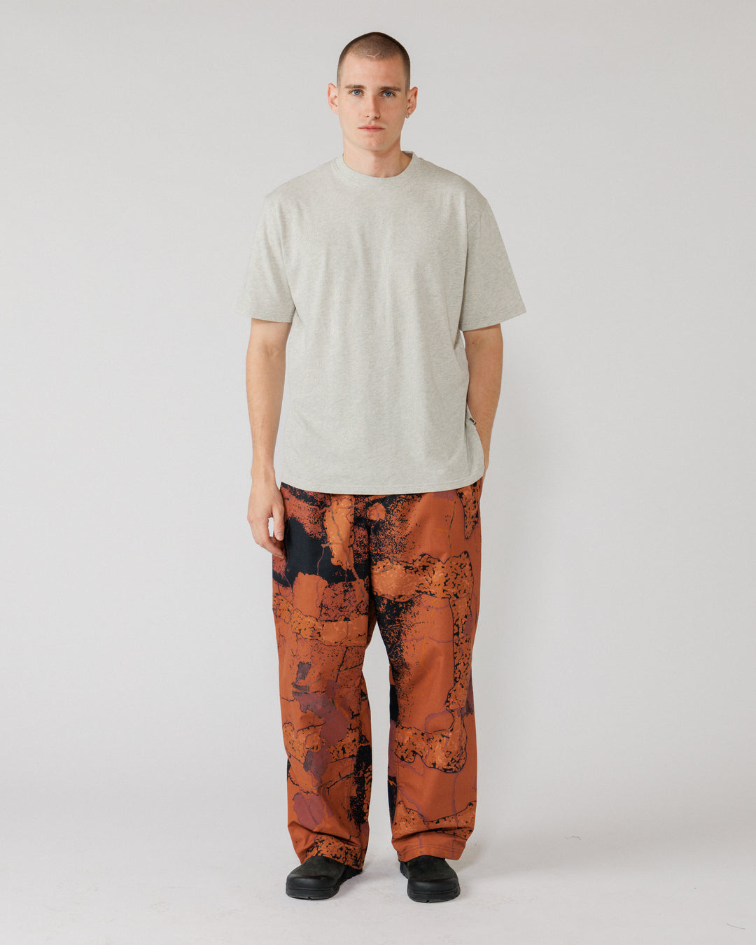 Water Resistant Zama Pants - Abstract Brick Camo — hero full front, pants legible