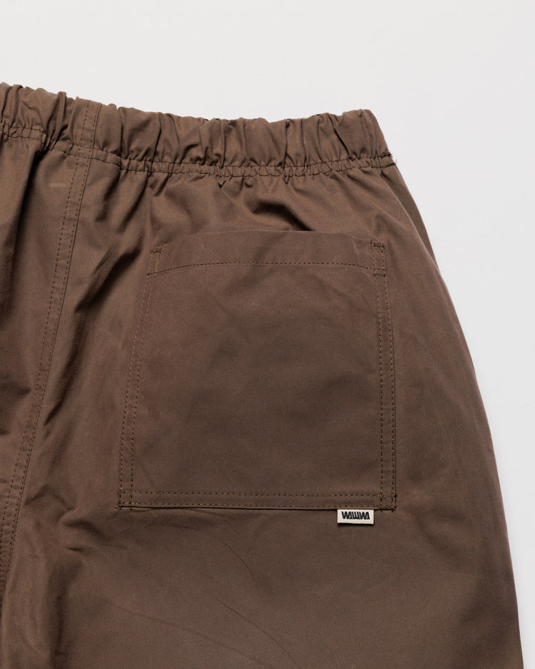 Water Resistant Zama Pants - Bracken — back pocket label detail